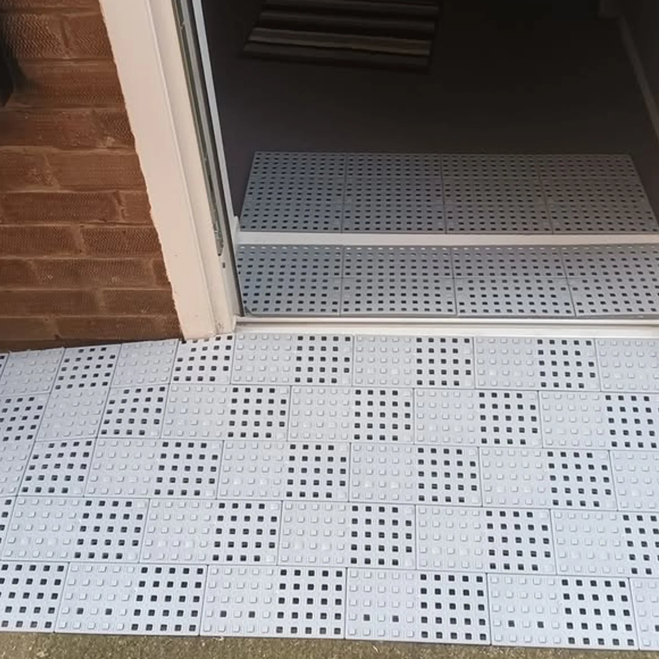 modular ramp and corner accessibility tiles